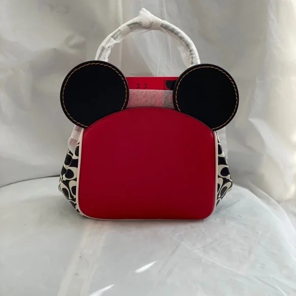 COACH MICKEY MOUSE X KEITH HARING KISSLOCK BAG
